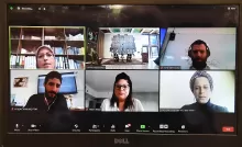 A zoom call showing six participants talking to each other.